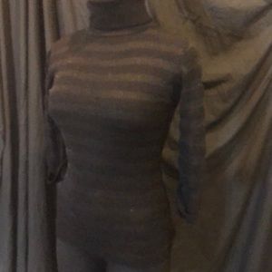 Bebe deceivingly sexy. Somewhat conservative.